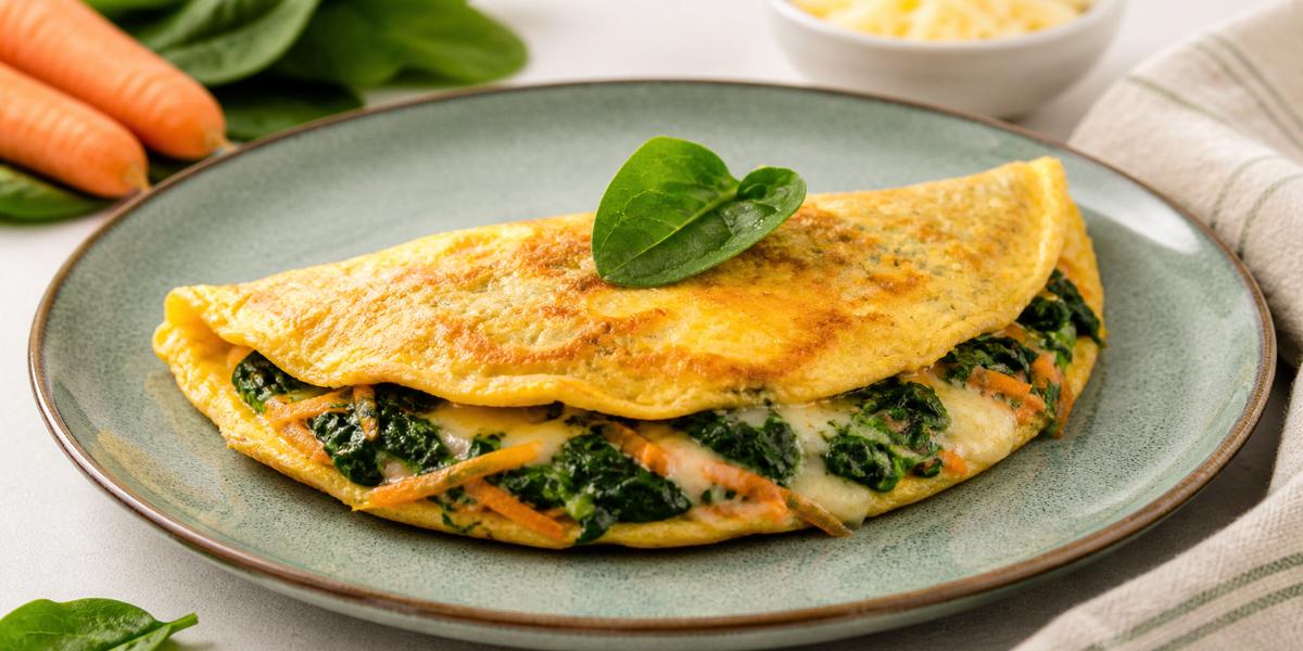 Tortilla de zanahoria y espinacas con queso fundido