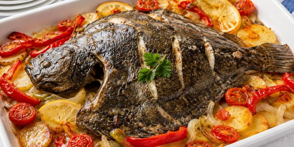 Rodaballo al horno con patatas panaderas y verduras